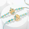 Meenakari Ganesh Rakhi - Set Of 2 Online