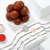 Moon And Sun Rakhis Set Of 4 And Gulab Jamun Combo Online