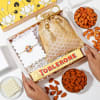 Navratna Rakhi And Flavoursome Delights Hamper Online