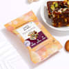 Shop Oval Kundan Rakhi And Dry Fruits Combo