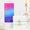 Pastel Ganesha Rakhi And Gourmet Chocolate Combo Online