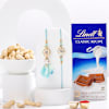 Pastel Meena Bhaiya Bhabhi Rakhi With Lindt Chocolate And Cashews Online