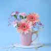 Peach and Pink Flowers in a Mug Online