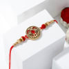 Peacock Antique Metal Rakhi Online