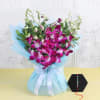 Pearl Rakhi With Bunch Of Orchids Online