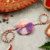 Pink And Lavender Seed Rakhi Online