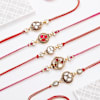 Gift Regal Meena and Kundan Rakhis-Set Of 5