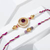 Regal Purple Stone And Pearl Rakhi - Set Of 2 Online