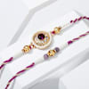 Regal Purple Stone And Pearl Rakhi - Set Of 2 Online