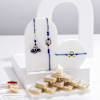 Royal Blue Rakhis And Sweets Combo Online