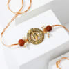 Buy Rudraksh Beads And Ganesha Rakhi