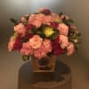 Seasonal flowers in tin container Online