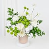 Serene White Blooms In Striped Ceramic Planter Online