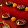 Buy Set of 4 Clay Diya with Maa Laxmi & Lord Ganesha Idols