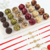 Set of 4 Rakhis With Dry Fruit Sweets Online