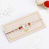 Buy Silver-Plated Peacock Feather Rakhi