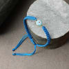 Buy Sky Blue String Evil Eye Bracelet Rakhi