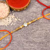 Stone Rakhi with Golden Beads Online