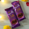 Gift Swastik Clay Diya with Dairy Milk Silk Bars & Kaju Katli (500 gms)
