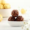 Buy Swastik Rakhi With Chocolates