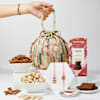 Temple Bhaiya Bhabhi Rakhi And Treats Hamper Online