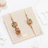 Buy Temple Shaped Bhaiya Bhabhi Rakhi with Beads Work