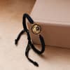 Buy Tirupati Black String Bracelet Rakhi