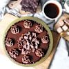 Buy Truffle Delight Cake With Bunch Of Roses And Orchids