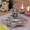White Metallic Ganesha Seven Batti Diya Online