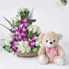 White Roses and Orchids in Cane Basket with Teddy Bear Online