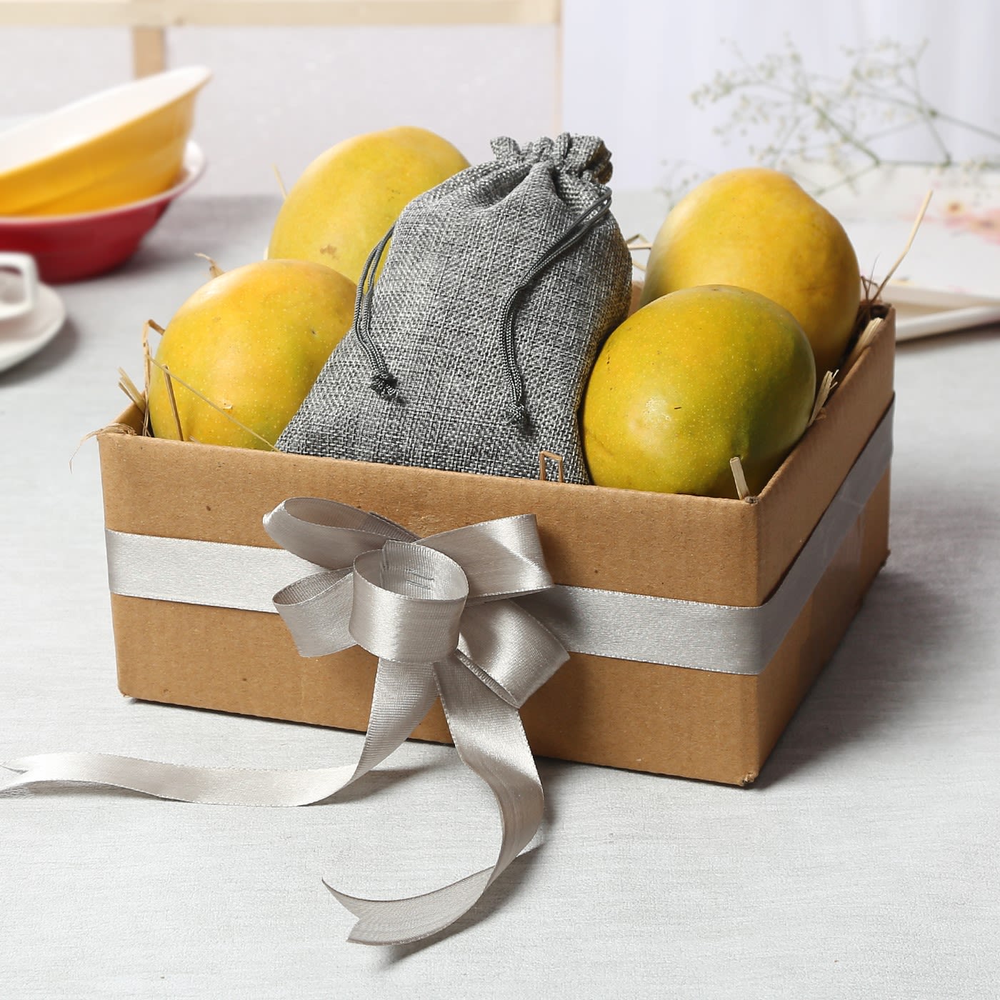 box of 4 alphonso mangoes with chocolate truffle hamper