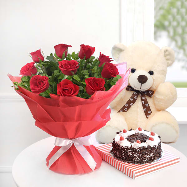 10 Red Roses with Teddy & Black Forest Cake (Half Kg)