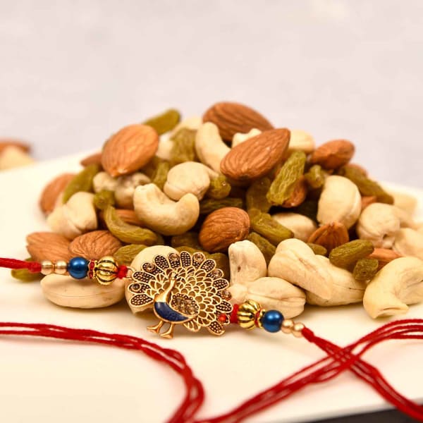Antique Peacock Rakhi with Dryfruits