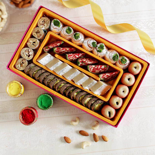 Assorted Mithai Box With Gulal Gift Send Holi Gifts Online J11026098 Igp Com It boasts a massive menu of sweets, savouries, chaat & bakery products. assorted mithai box with gulal
