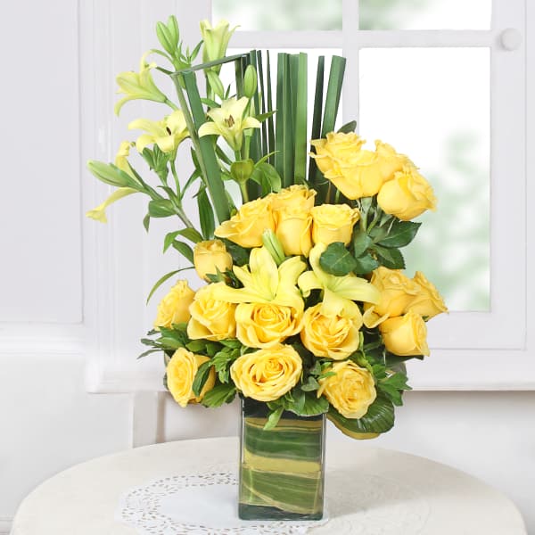 Assorted Yellow Flowers in a Vase
