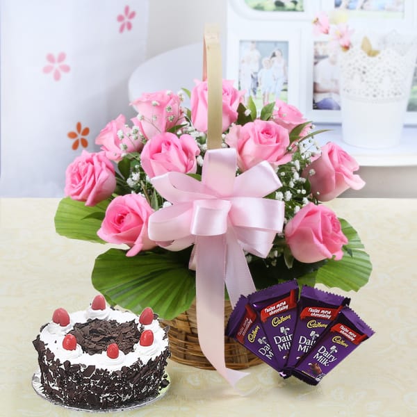 Basket of 10 Pink Roses with Half Kg Black Forest Cake Eggless & Dairy
