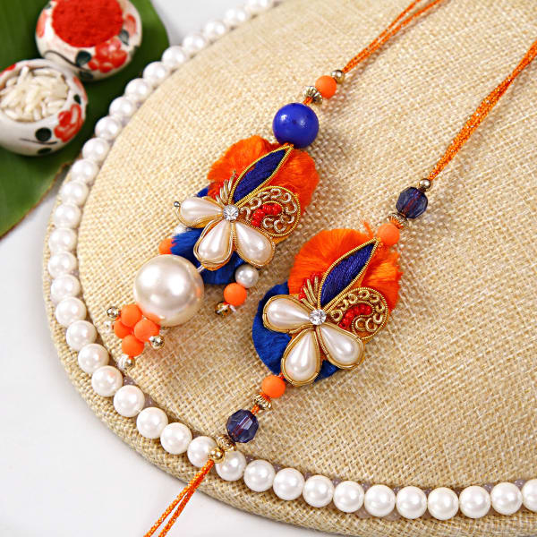 Beautiful Bhaiya Bhabhi Rakhi Set: Gift/Send Rakhi Gifts Online ...