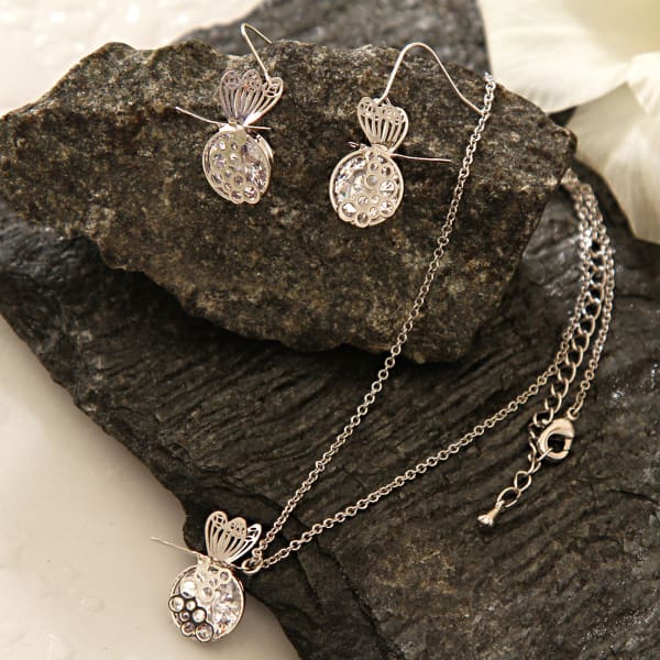 Beautiful Pendent Set of CZ Stone Studs Caged in Butterflies