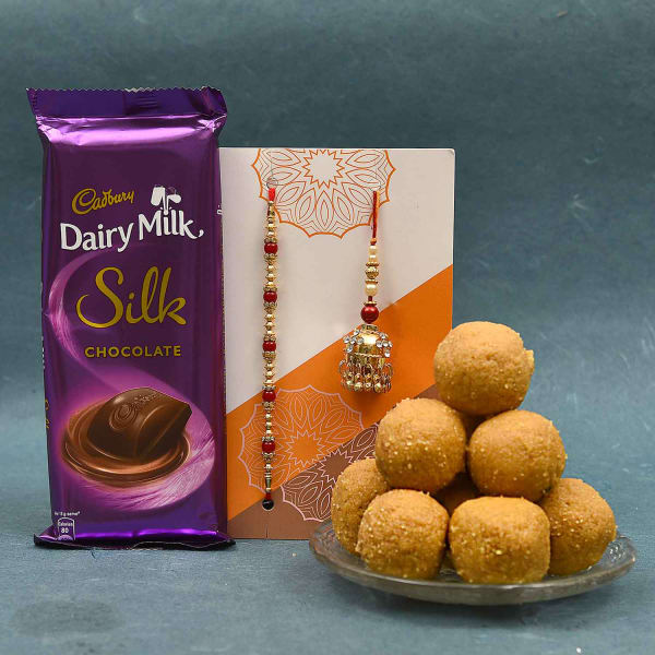 Bhaiya Bhabhi Rakhi & Dairy Milk Chocolate with Besan Laddu Hamper