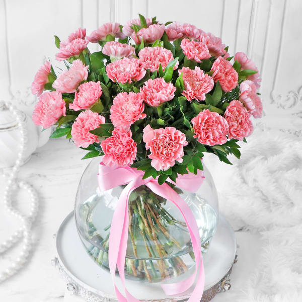 Bouquet of Light Pink Carnations in Globe Vase (25 stems)