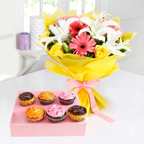 Bunch of Mix Flowers with Delicious Cupcakes