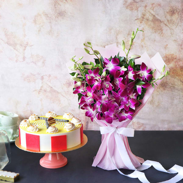 Butterscotch Swirl Cake WIth Bunch Of Purple Orchids (Half kg)