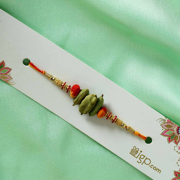 Cardamom Rakhi With Kaju Barfi: Gift/Send Rakhi Gifts Online J11097719 ...