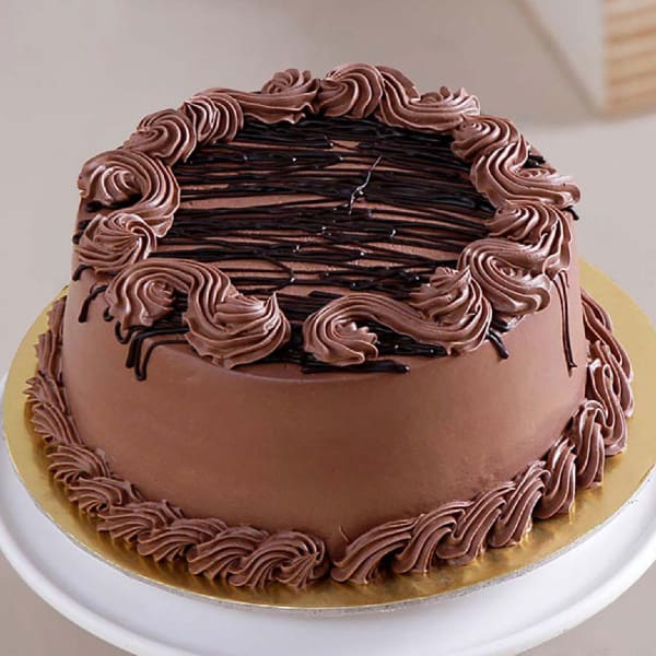 Order Chocolate Cake with Chocolate Cream Topping Half Kg