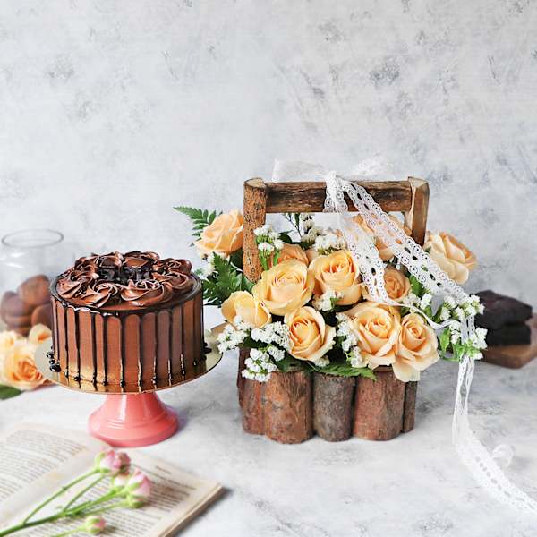 Dark Chocolate Ganache Cake With Basket Of Peach Roses