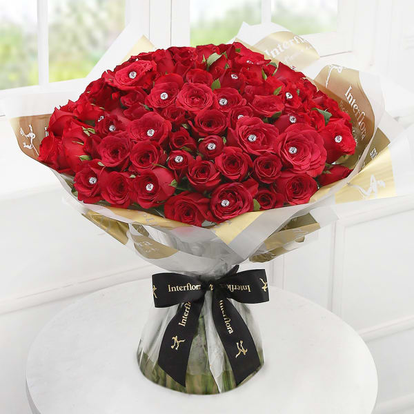 Dazzling 100 Red Roses Hand Tied