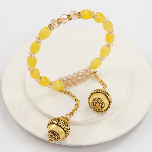 Dazzling Yellow Beaded Lumba Rakhi