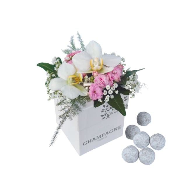 Decorated champagne truffles, white-pink flowers