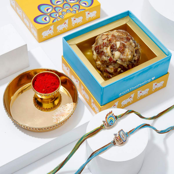 Elegant Peacock Rakhi With Jumbo Dry Fruit Laddoo