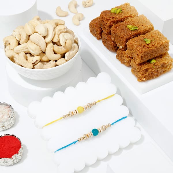 Elegant Pearl Rakhi And Healthy Delights Hamper